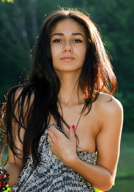 Slender brunette teen Malina A reveals tiny tits and hairy pussy outdoor